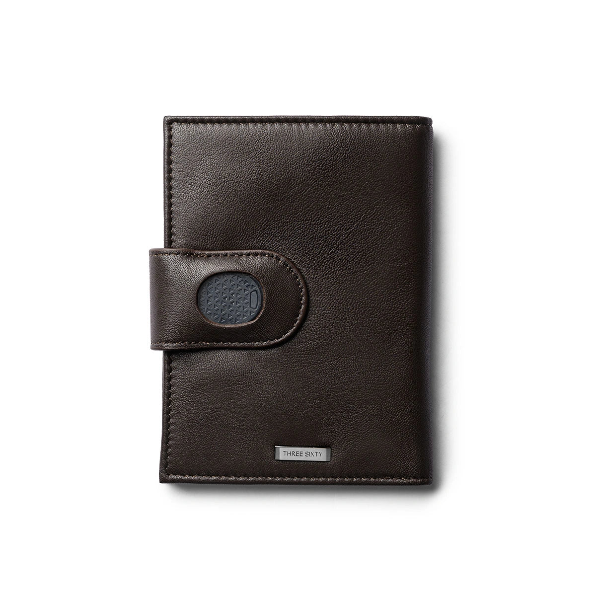 Orbit Smart Passport Holder Bi-Fold in Brown leather with Dolphin Max tracker attached to a passport and travel essentials