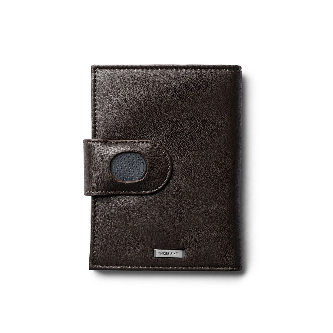 Orbit Smart Passport Holder Bi-Fold in Brown leather with Dolphin Max tracker attached to a passport and travel essentials
