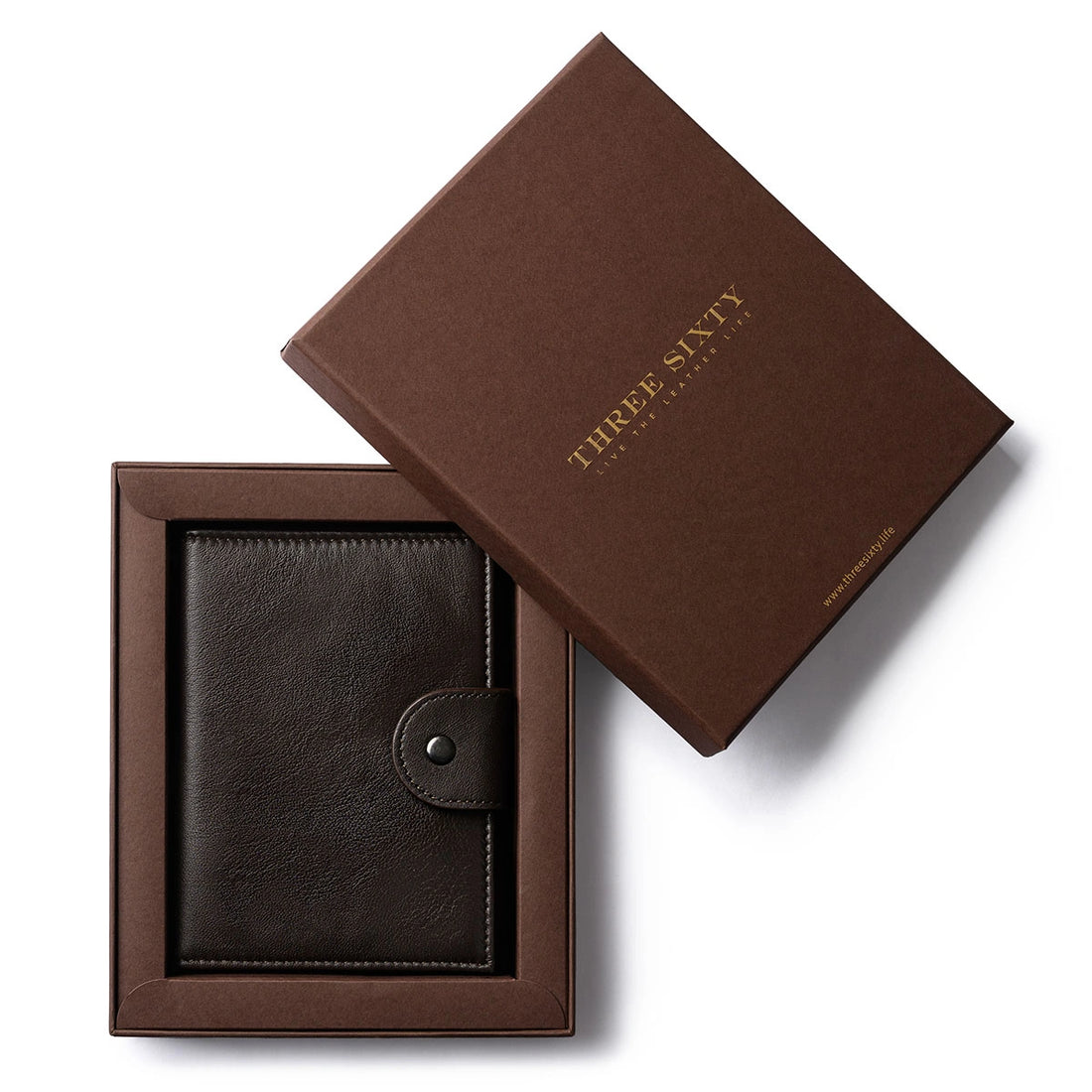 Orbit Smart Passport Holder Bi-Fold in Brown leather with Dolphin Max tracker attached to a passport and travel essentials